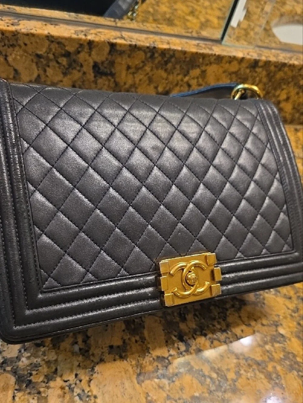 CHANEL Medium Boy Bag Quilted Lambskin Crossbody with Gold Hardware.